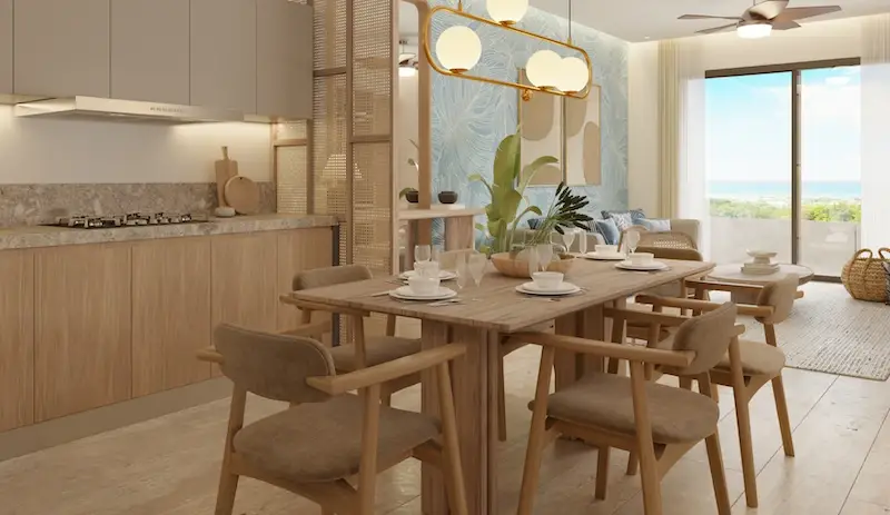 Cocina y comedor de Village BLU con salida a la terraza y vista al mar